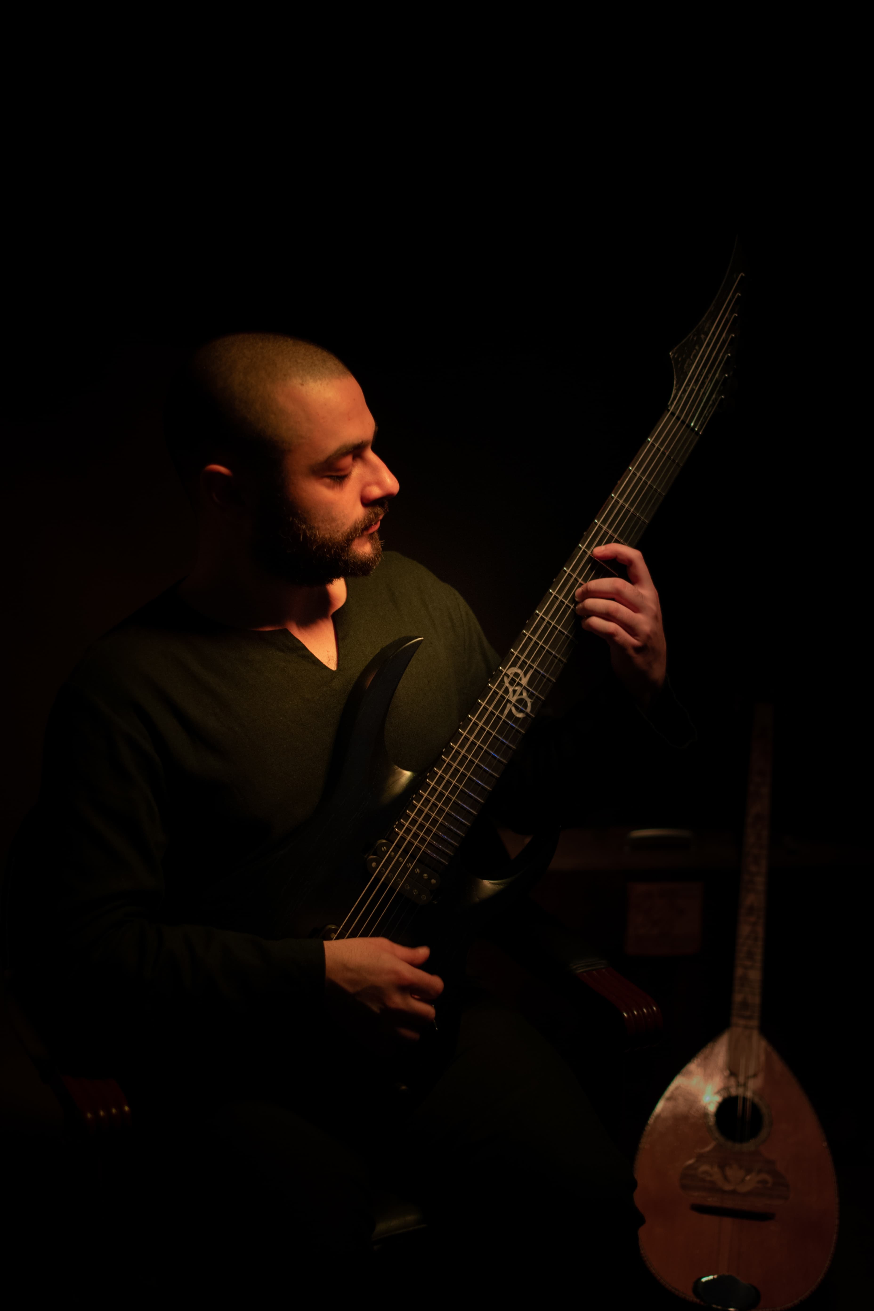 Youssef Helayel playing guitar